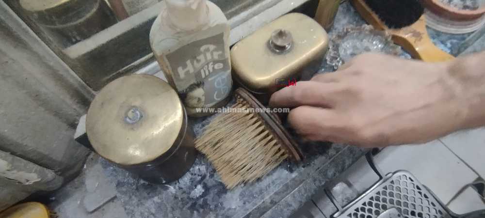 عم مصطفى حلاق العطارين